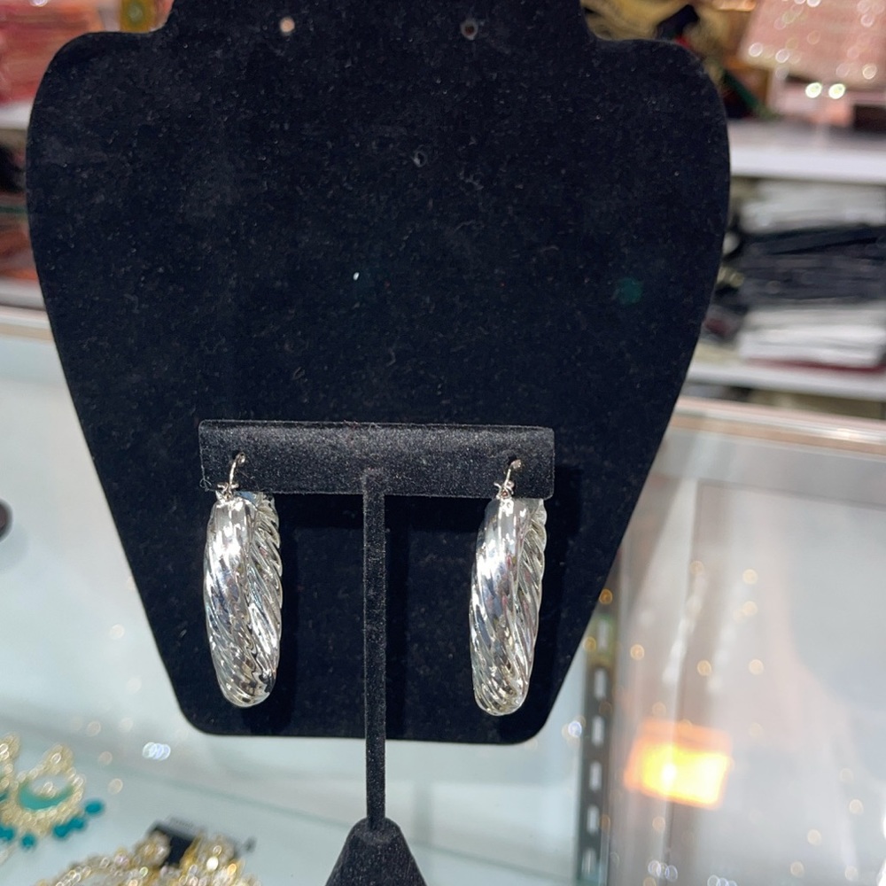 Twisted Hoops in silver color all new just came in